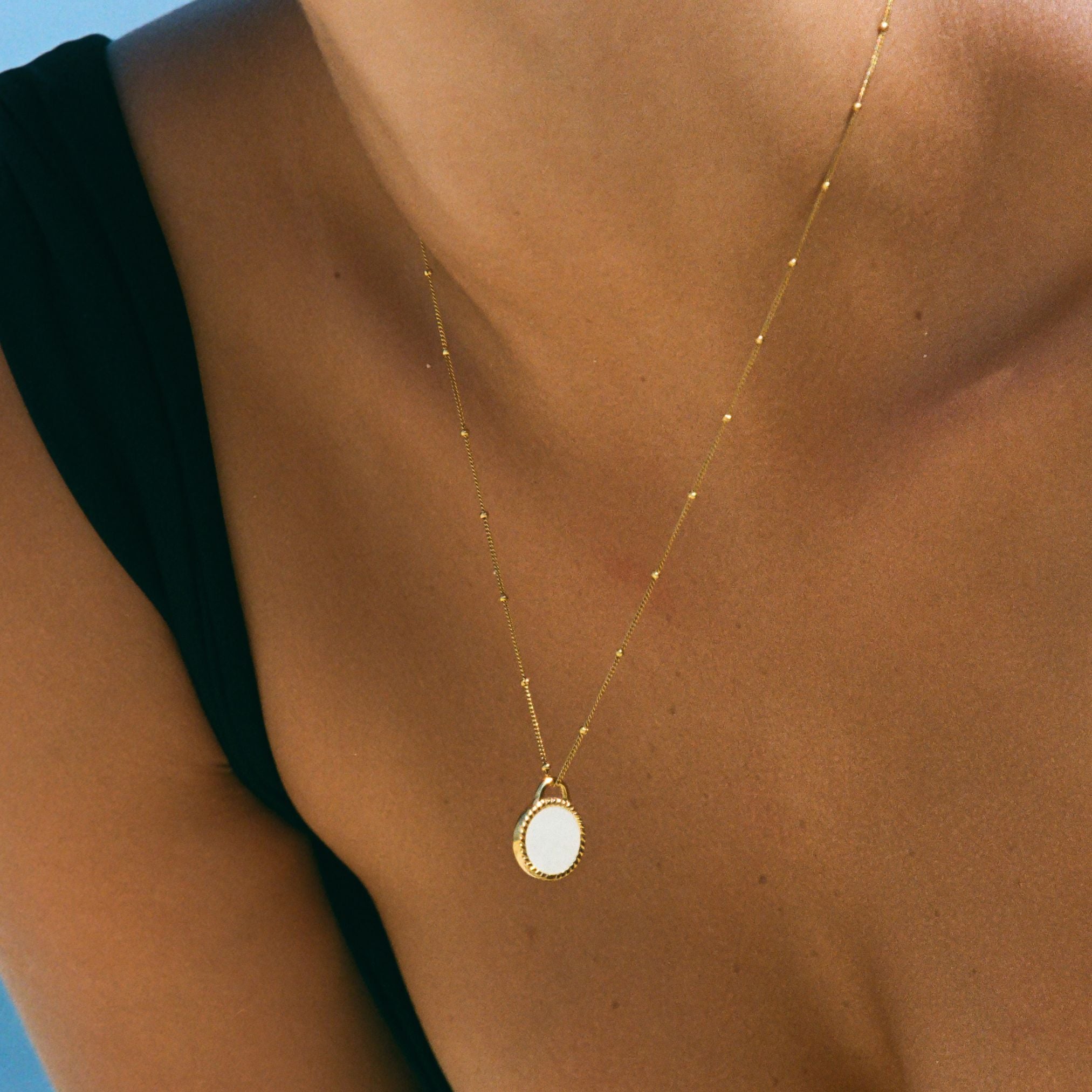 Gold mother of pearl necklace