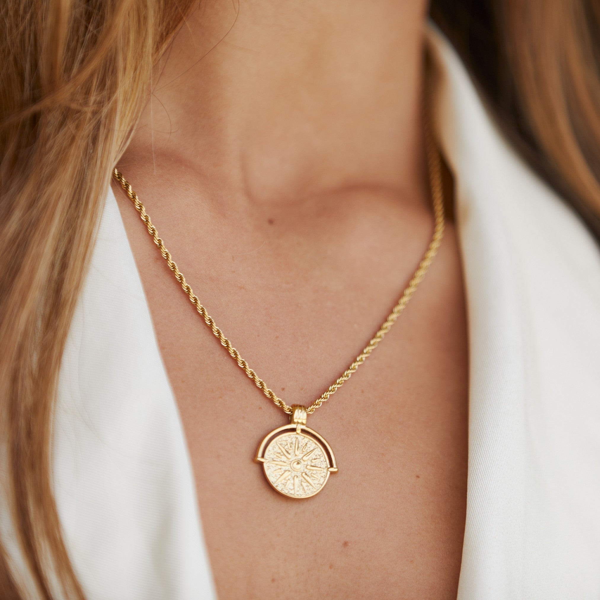 Gold sun necklace